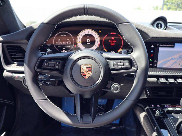 new 2026 Porsche 911 car, priced at $304,460