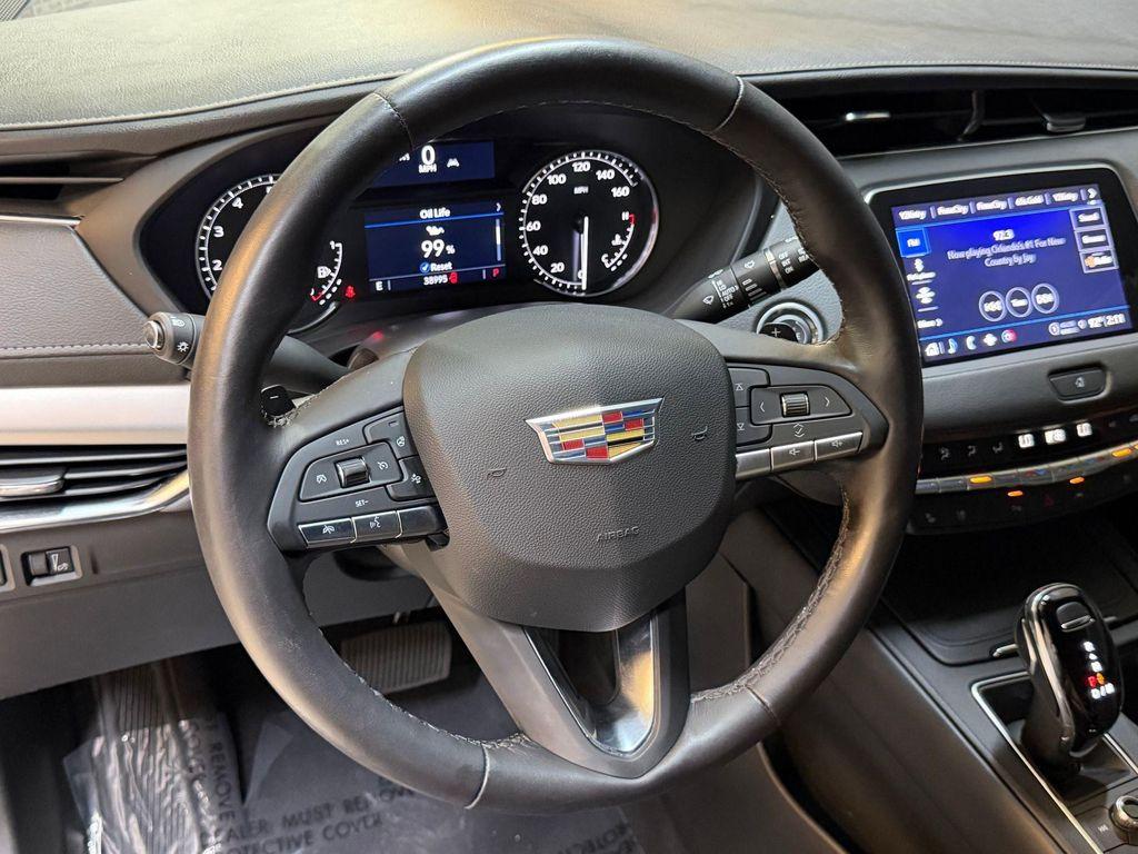 used 2023 Cadillac XT4 car, priced at $28,496