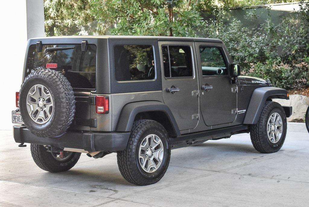 used 2018 Jeep Wrangler JK Unlimited car, priced at $21,500