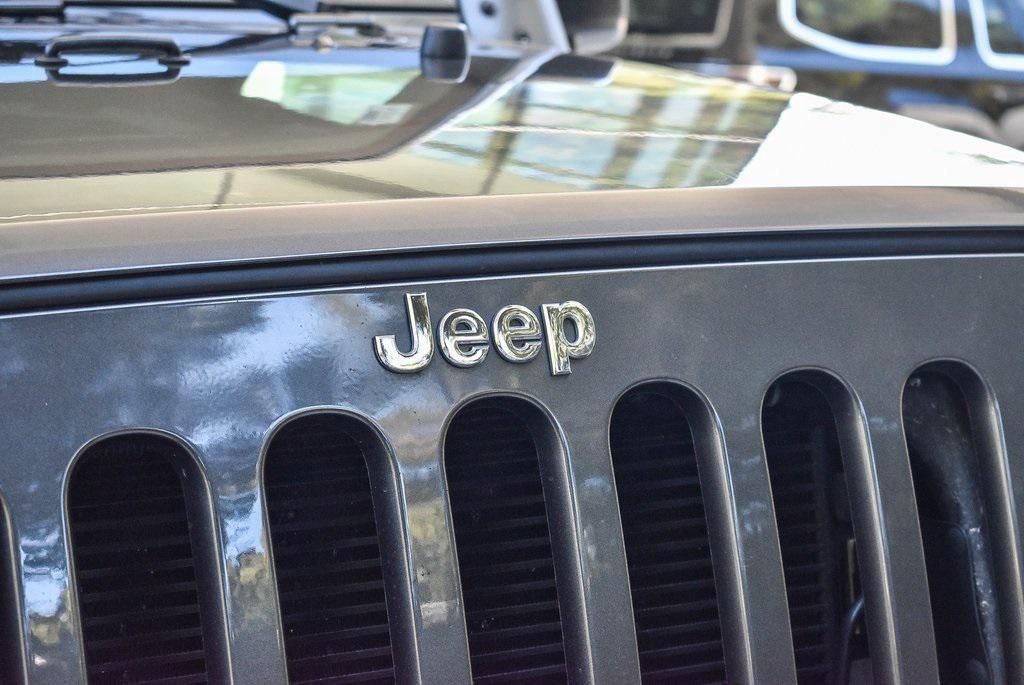 used 2018 Jeep Wrangler JK Unlimited car, priced at $21,500