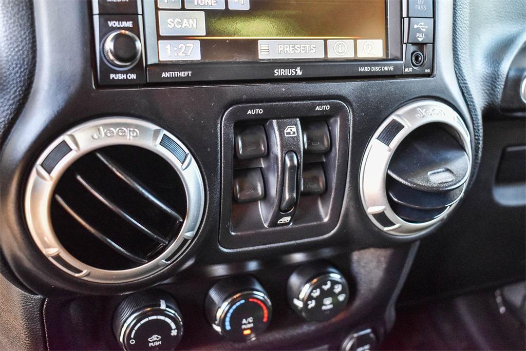 used 2015 Jeep Wrangler Unlimited car, priced at $17,995