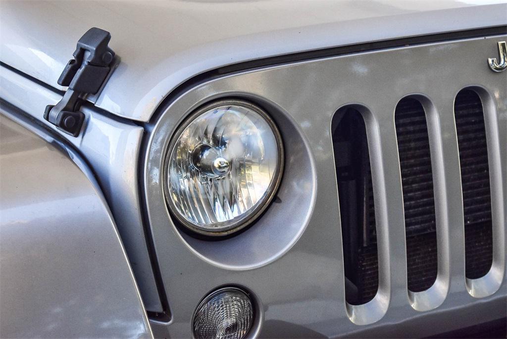 used 2015 Jeep Wrangler Unlimited car, priced at $17,995