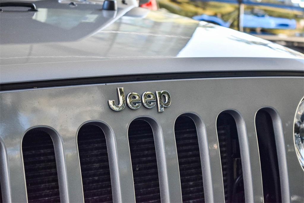 used 2015 Jeep Wrangler Unlimited car, priced at $17,995