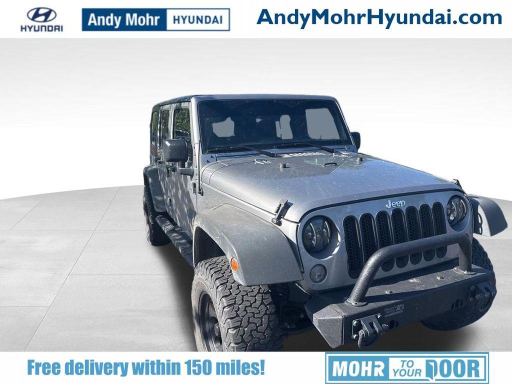 used 2018 Jeep Wrangler JK Unlimited car, priced at $23,390