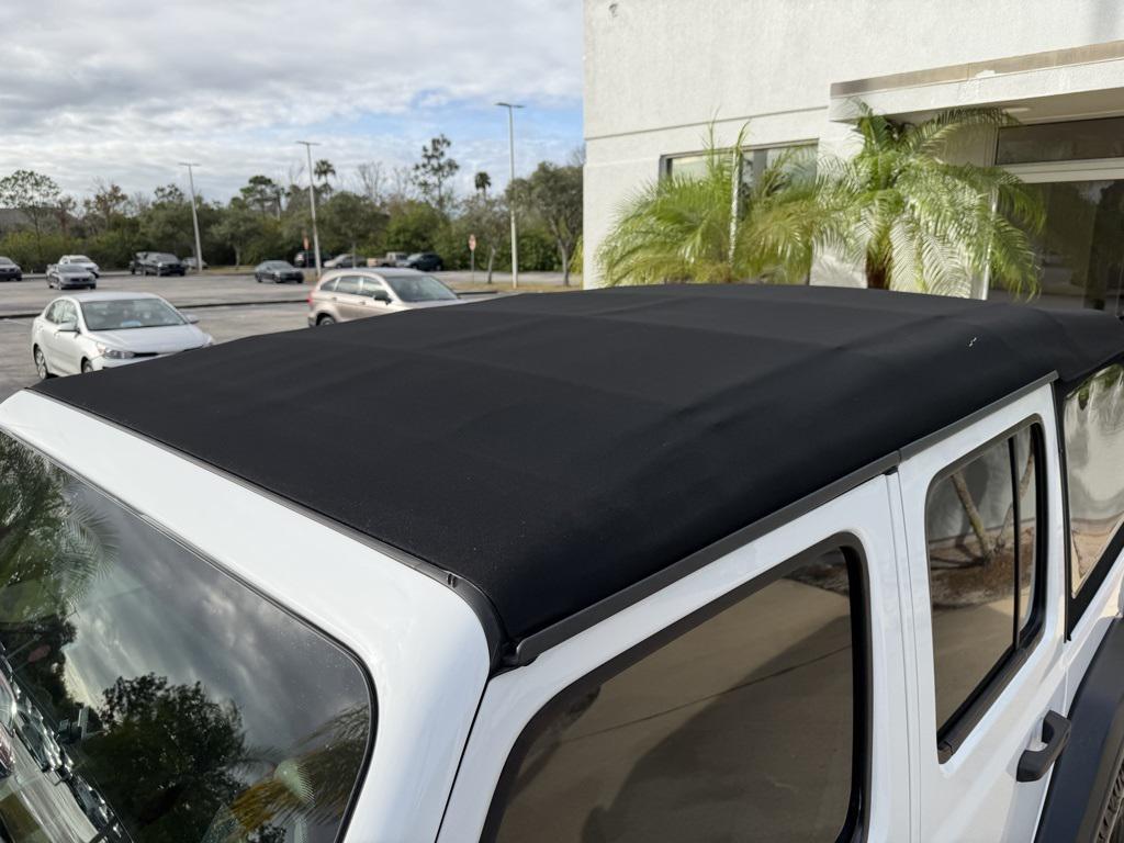 used 2023 Jeep Wrangler car, priced at $28,695