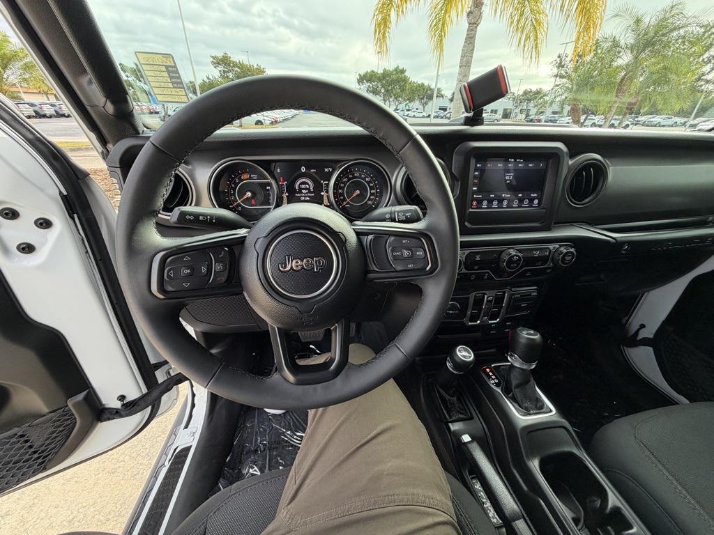used 2023 Jeep Wrangler car, priced at $28,695