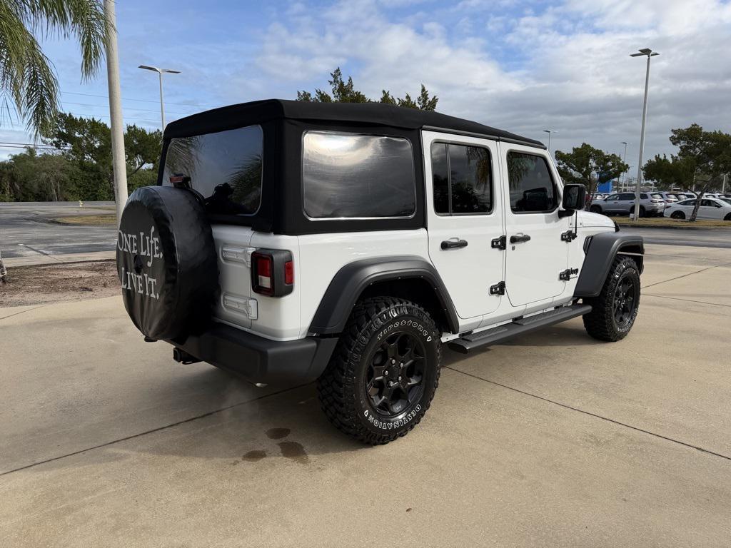 used 2023 Jeep Wrangler car, priced at $28,695