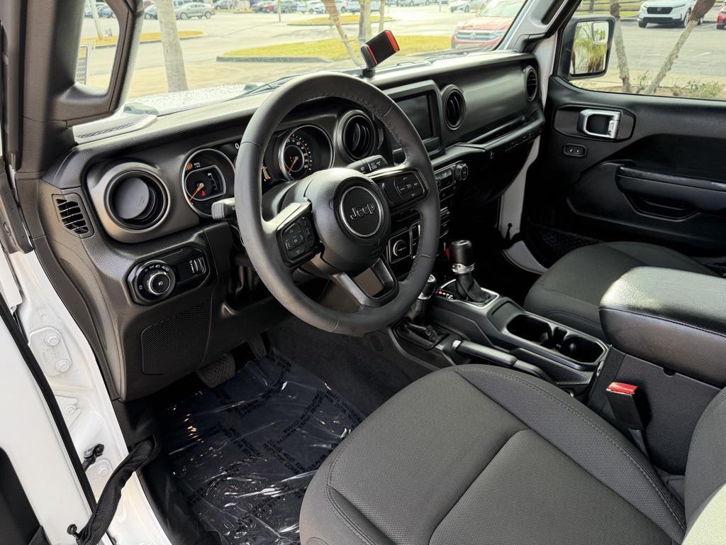 used 2023 Jeep Wrangler car, priced at $28,695