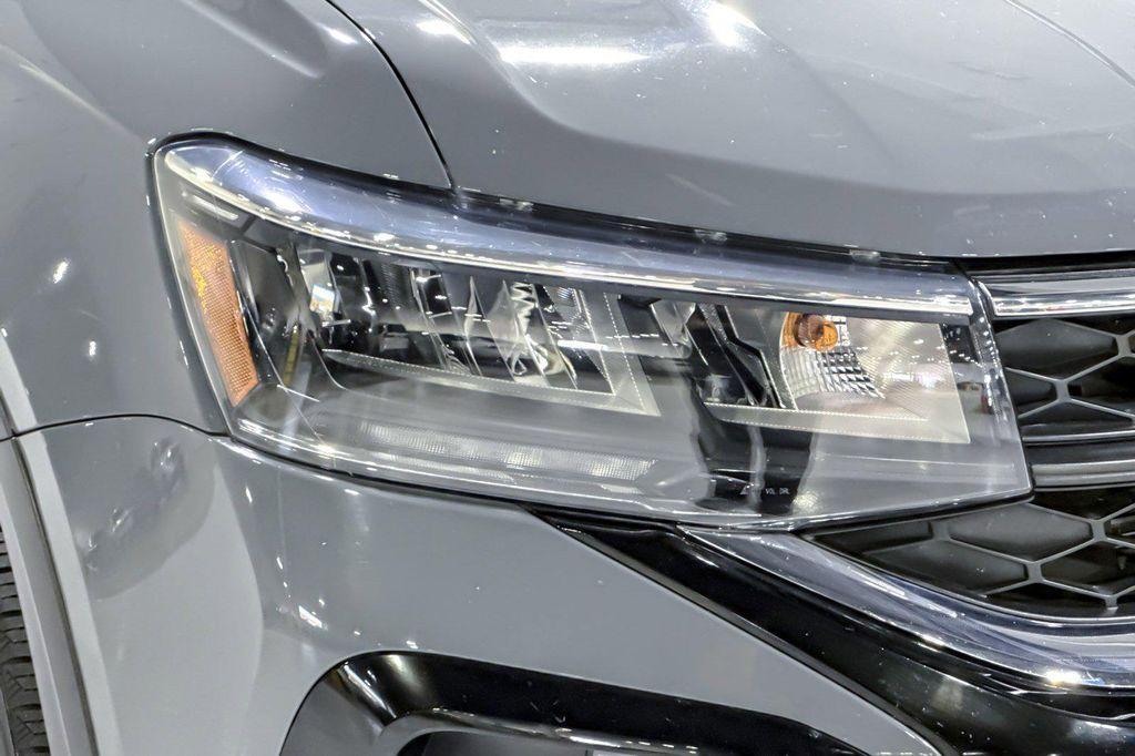 used 2023 Volkswagen Taos car, priced at $22,084
