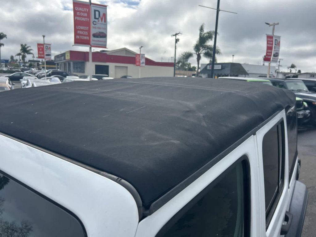 used 2018 Jeep Wrangler Unlimited car, priced at $22,972