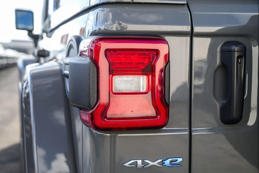 used 2023 Jeep Wrangler 4xe car, priced at $27,991