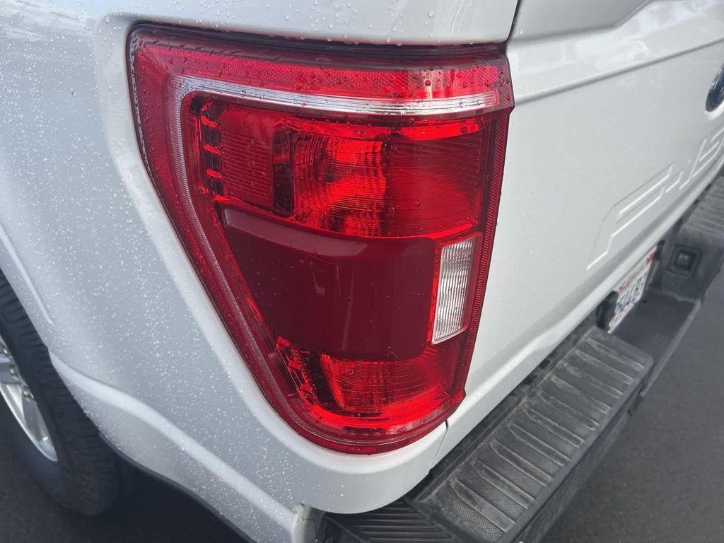 used 2021 Ford F-150 car, priced at $28,013