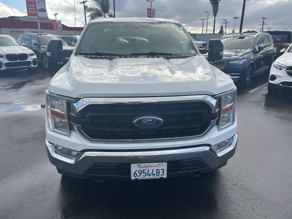 used 2021 Ford F-150 car, priced at $28,013