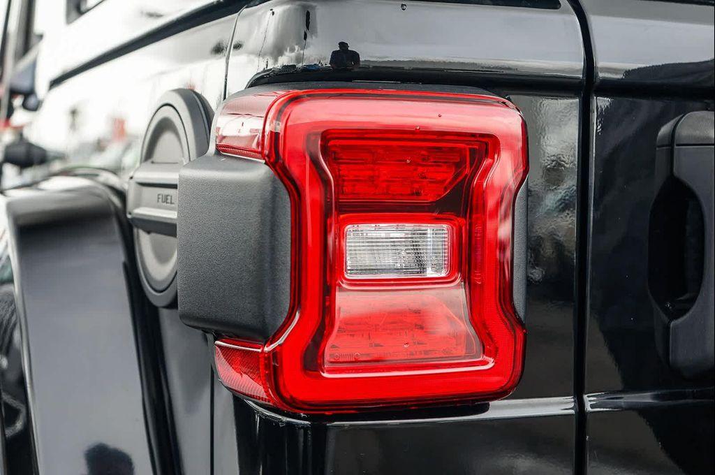 used 2023 Jeep Wrangler 4xe car, priced at $31,180