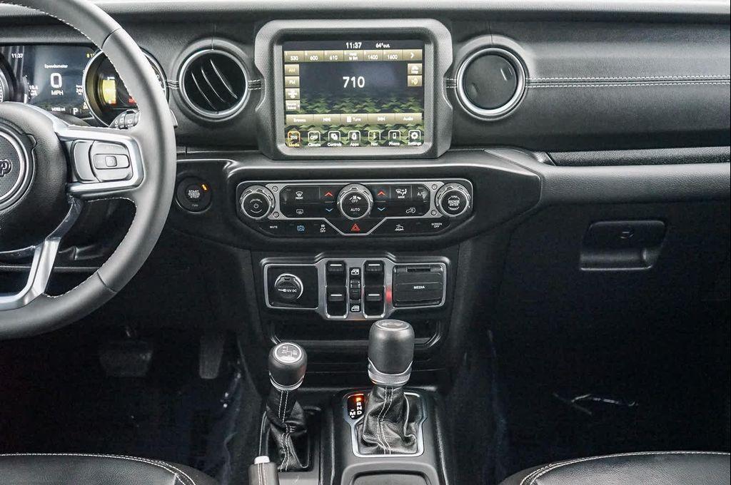 used 2023 Jeep Wrangler 4xe car, priced at $31,180