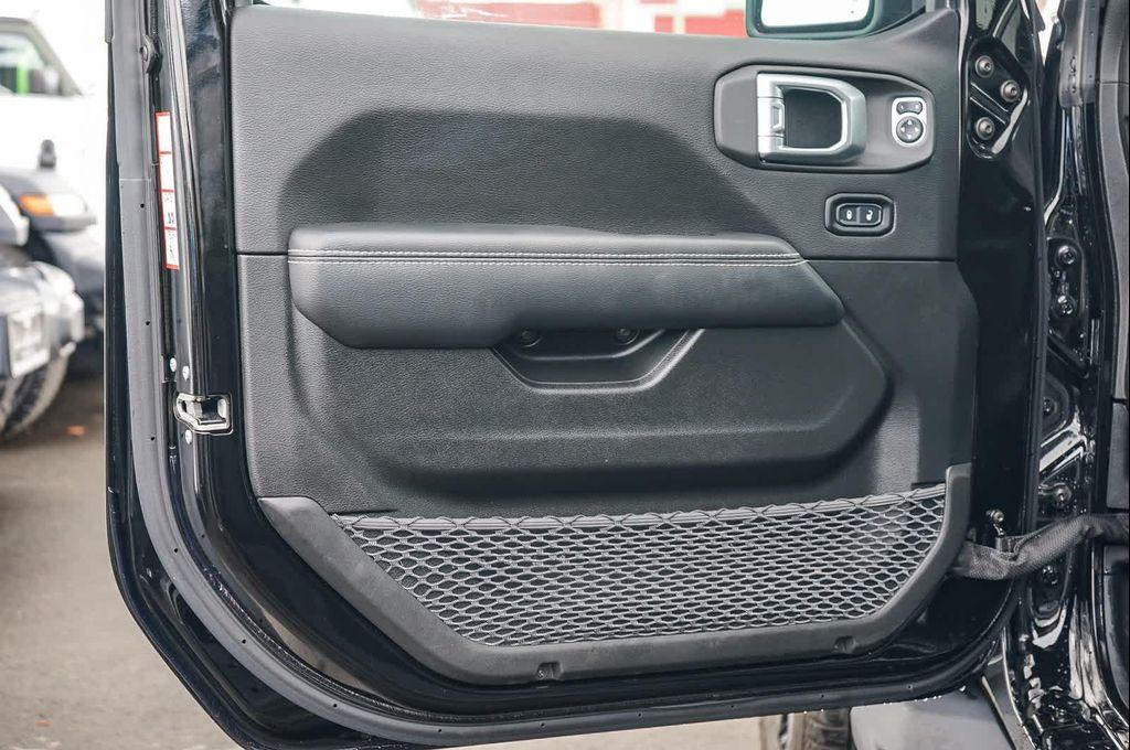 used 2023 Jeep Wrangler 4xe car, priced at $31,180