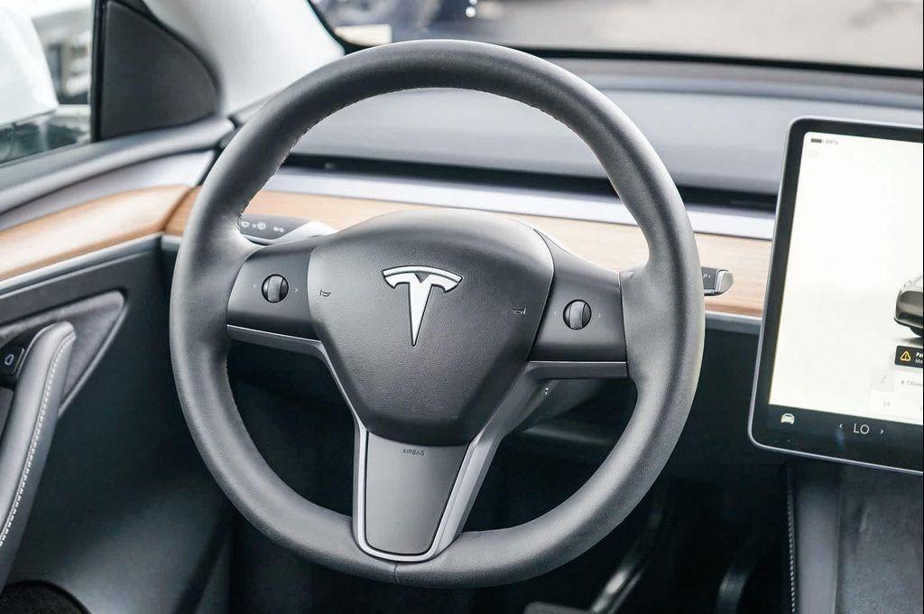 used 2024 Tesla Model Y car, priced at $33,399