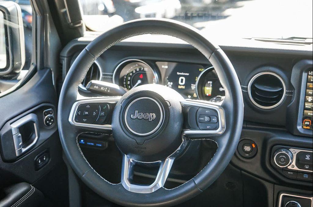 used 2023 Jeep Wrangler 4xe car, priced at $29,274