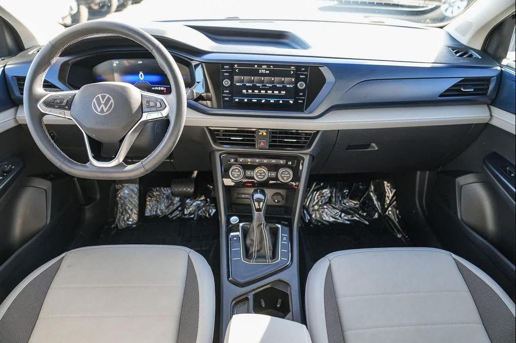 new 2024 Volkswagen Taos car, priced at $20,476