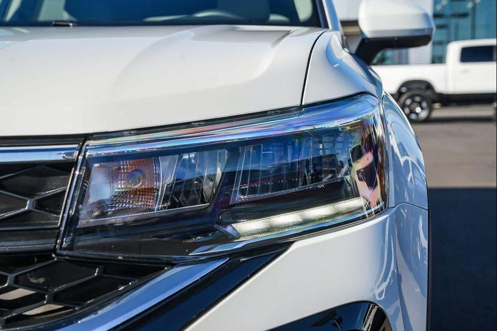 new 2024 Volkswagen Taos car, priced at $20,476