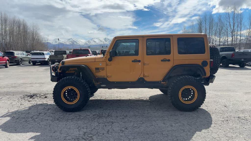 used 2014 Jeep Wrangler Unlimited car, priced at $25,995