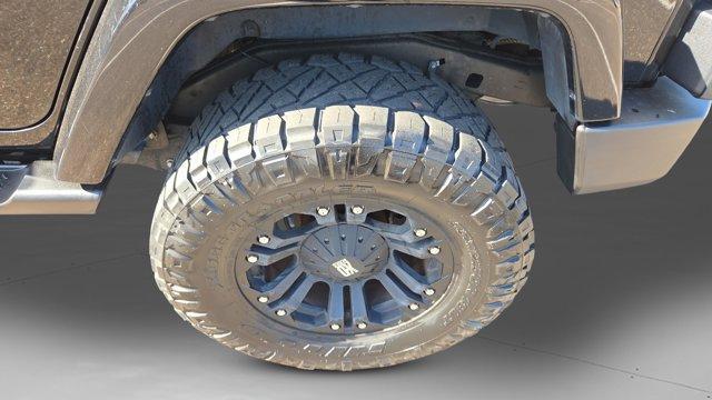 used 2016 Jeep Wrangler Unlimited car, priced at $16,291