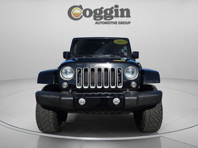 used 2016 Jeep Wrangler Unlimited car, priced at $16,291