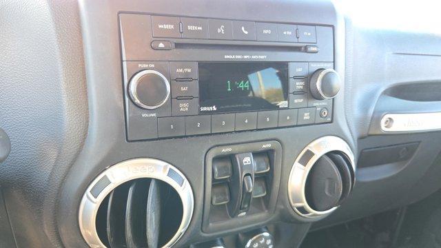 used 2016 Jeep Wrangler Unlimited car, priced at $16,291