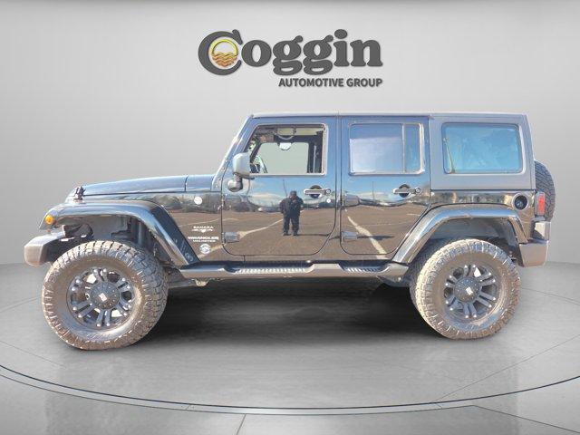 used 2016 Jeep Wrangler Unlimited car, priced at $16,291