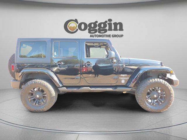 used 2016 Jeep Wrangler Unlimited car, priced at $16,291