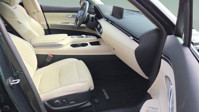 used 2023 Genesis GV70 car, priced at $32,291