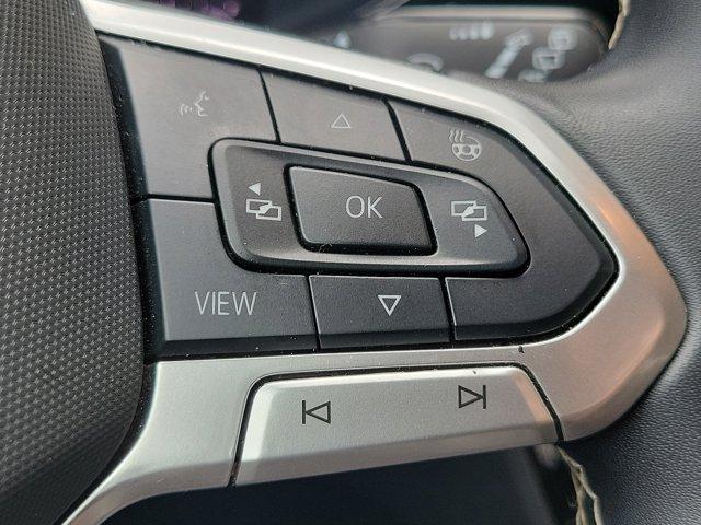 used 2024 Volkswagen Taos car, priced at $19,917