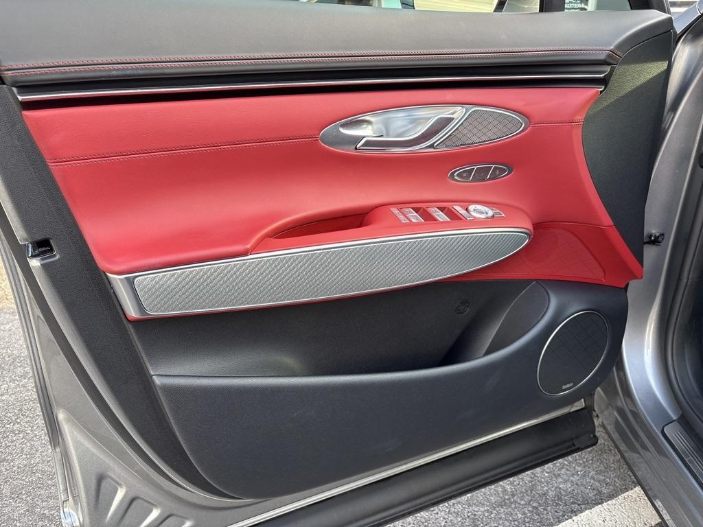 used 2023 Genesis GV70 car, priced at $43,107