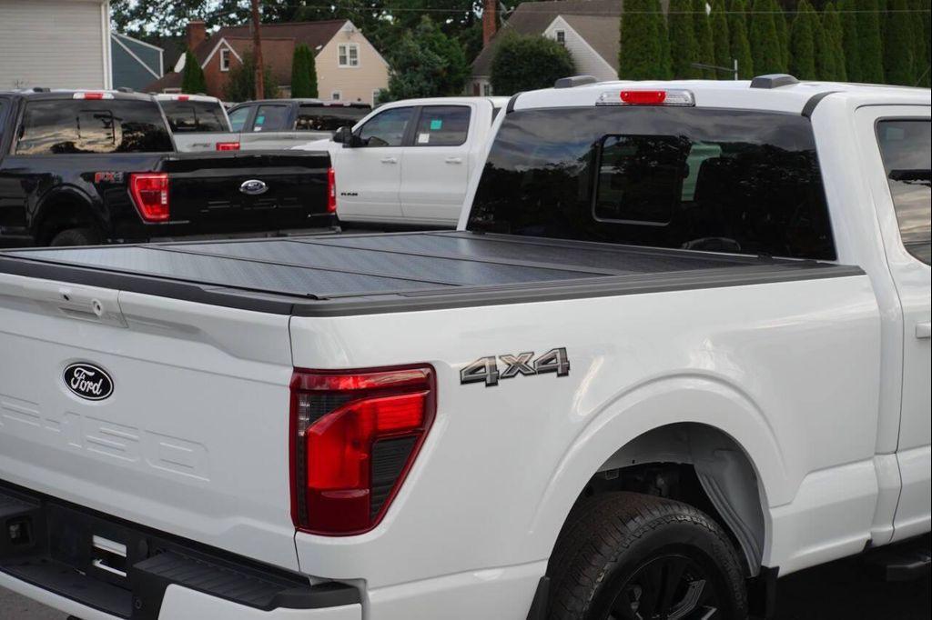used 2024 Ford F-150 car, priced at $46,875