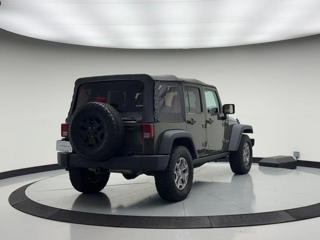 used 2015 Jeep Wrangler Unlimited car, priced at $18,285