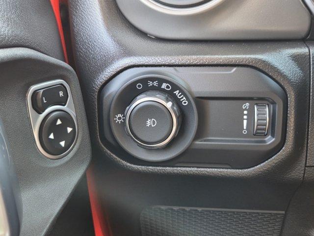 used 2023 Jeep Wrangler car, priced at $28,621