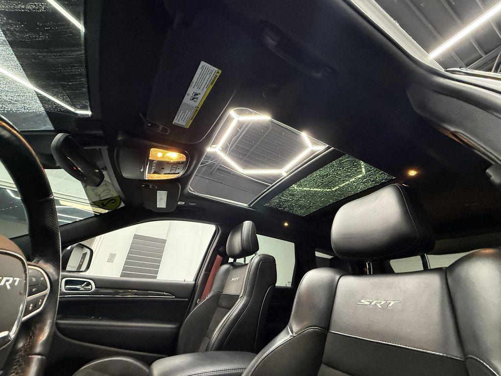 used 2021 Jeep Grand Cherokee car, priced at $57,900