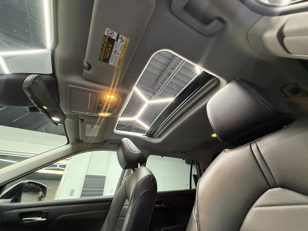 used 2021 Toyota Highlander Hybrid car, priced at $26,900