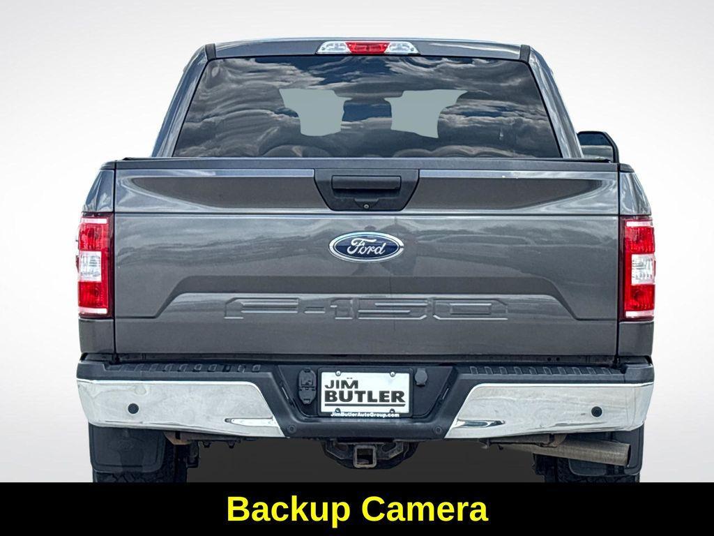 used 2018 Ford F-150 car, priced at $23,543
