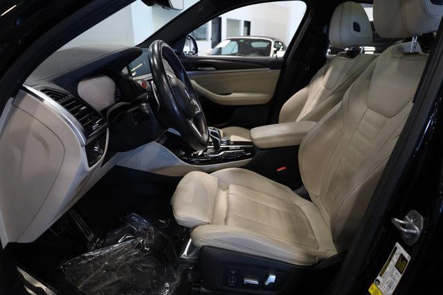 used 2021 BMW X4 M car, priced at $46,900