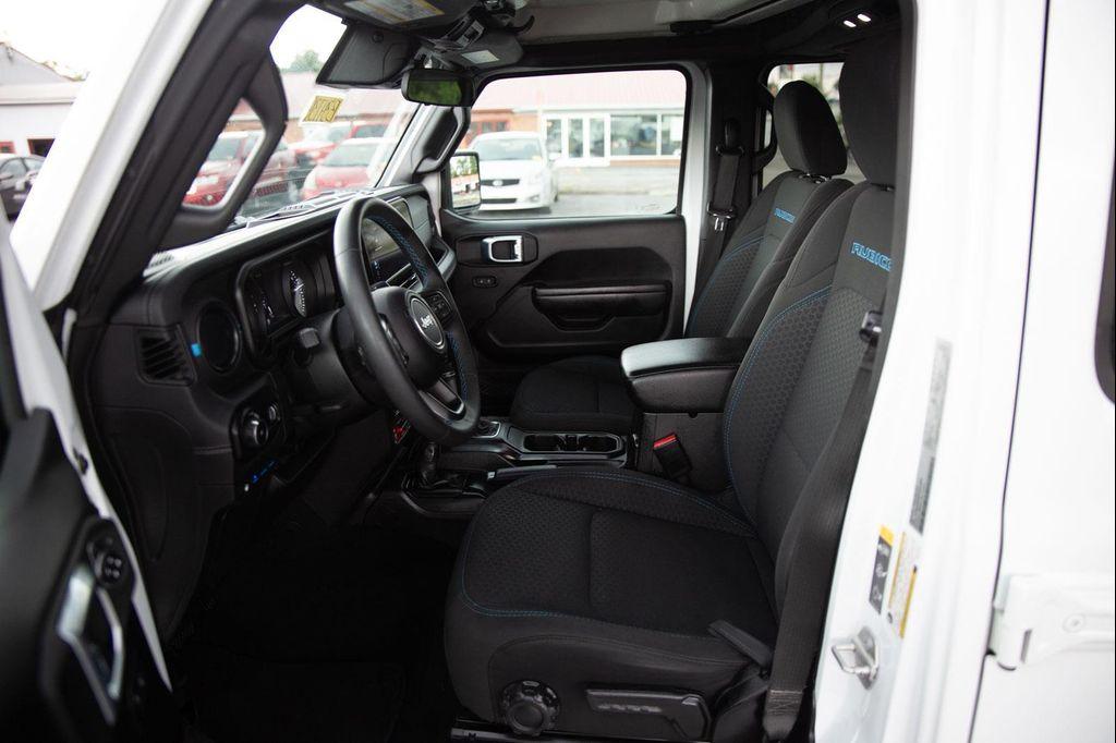 used 2024 Jeep Wrangler 4xe car, priced at $30,000