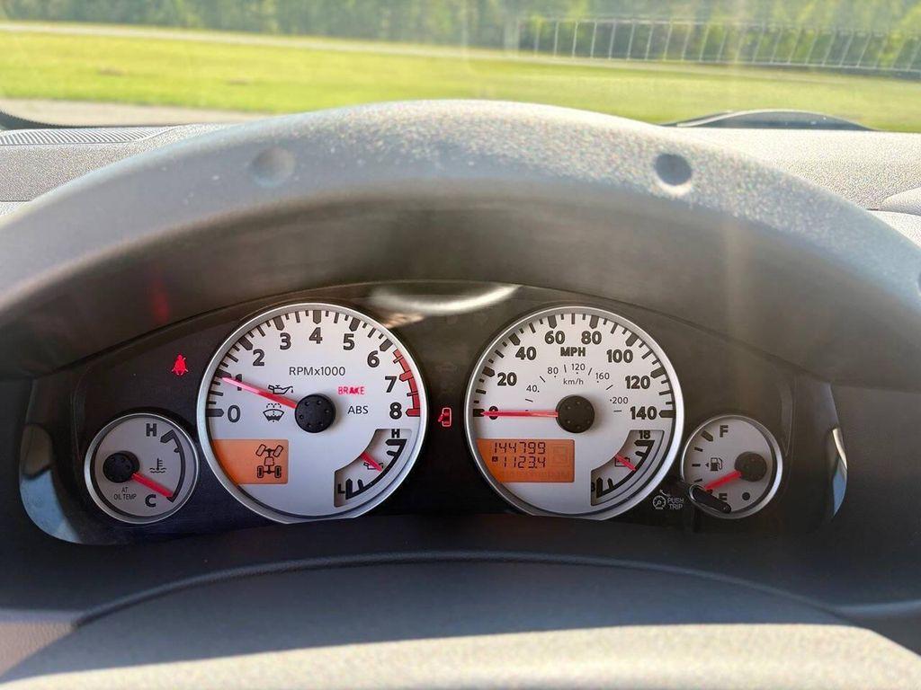 used 2012 Nissan Xterra car, priced at $11,999