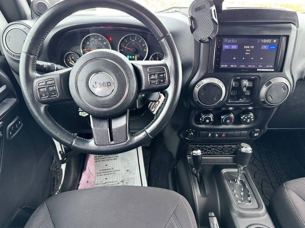 used 2013 Jeep Wrangler Unlimited car, priced at $13,999