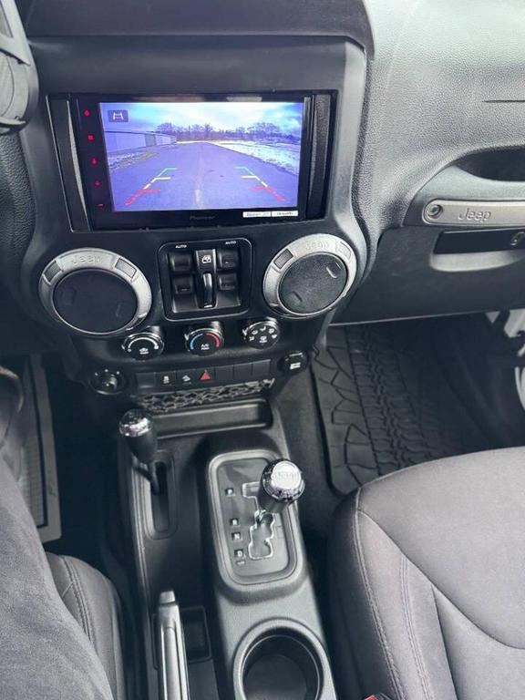 used 2013 Jeep Wrangler Unlimited car, priced at $13,999