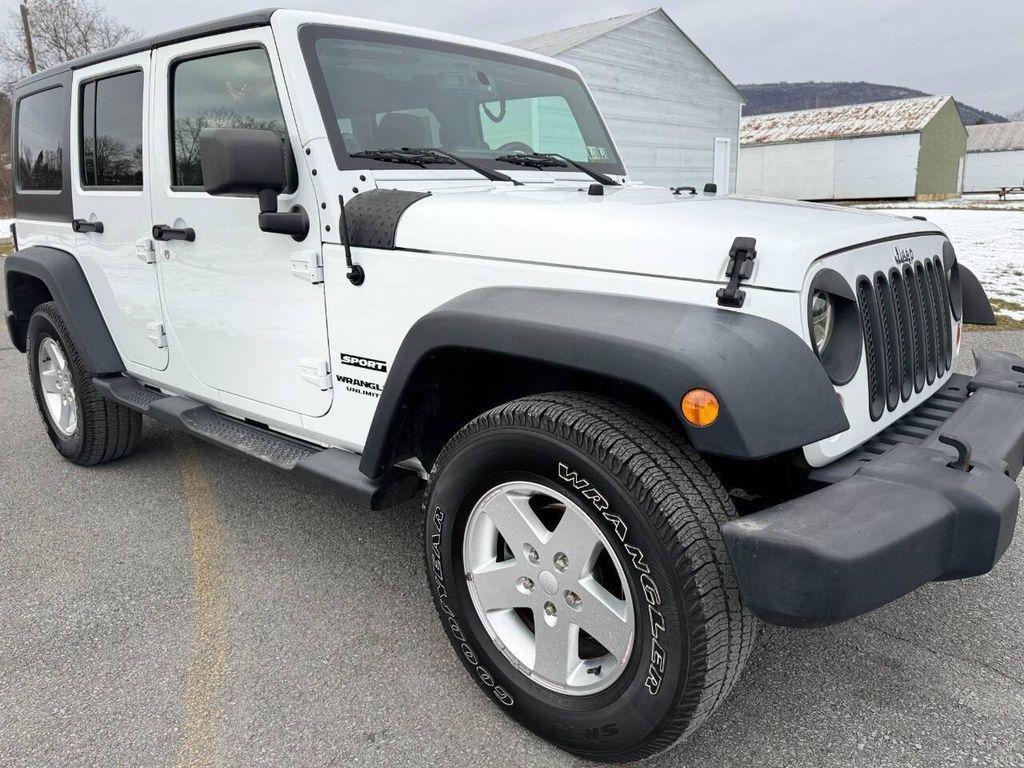 used 2013 Jeep Wrangler Unlimited car, priced at $13,999