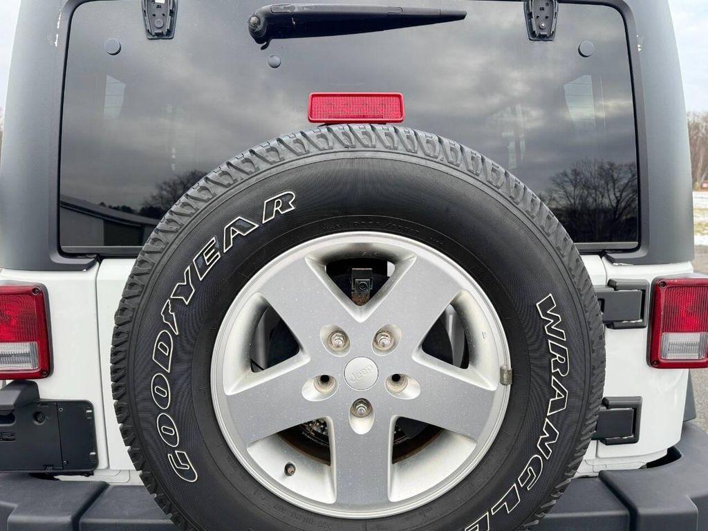 used 2013 Jeep Wrangler Unlimited car, priced at $13,999