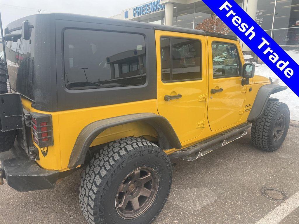 used 2015 Jeep Wrangler Unlimited car, priced at $14,399