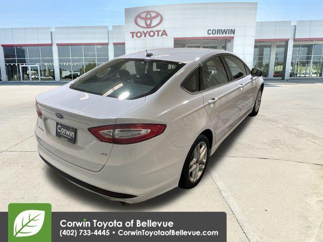 used 2014 Ford Fusion car, priced at $7,200