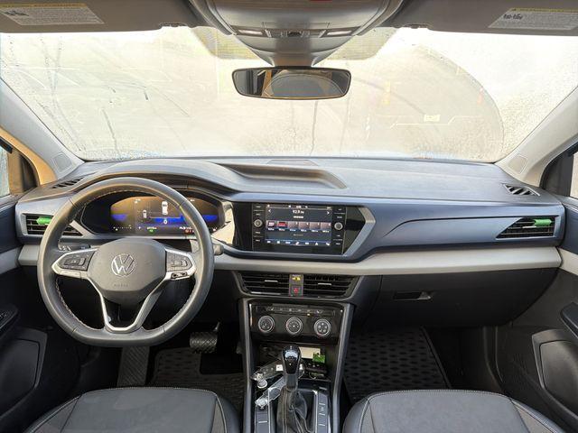 used 2023 Volkswagen Taos car, priced at $18,495