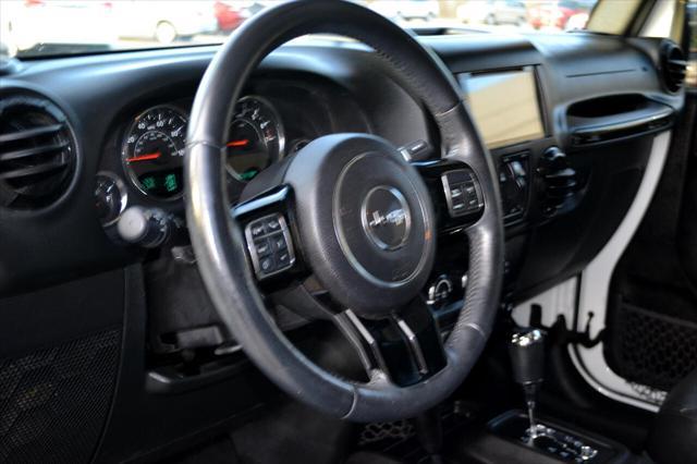 used 2015 Jeep Wrangler Unlimited car, priced at $22,991